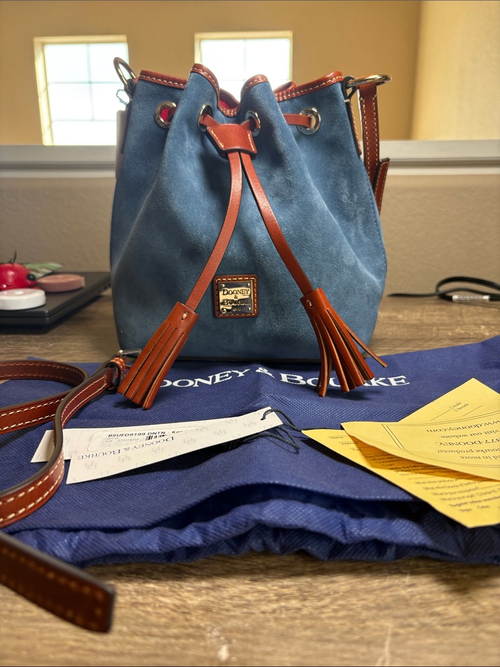 Dooney & Bourke Blue Suede Drawstring Crossbody with Brown Trim